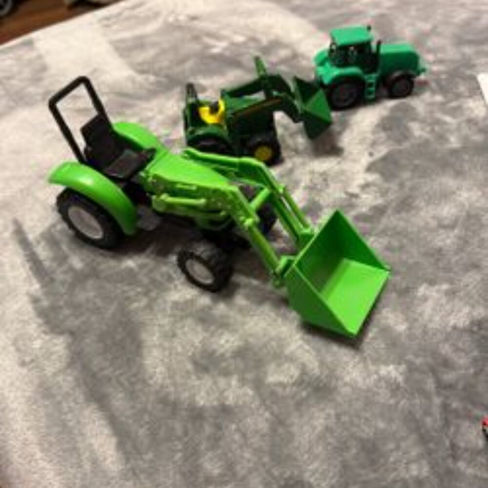 Three Farm Vehicles